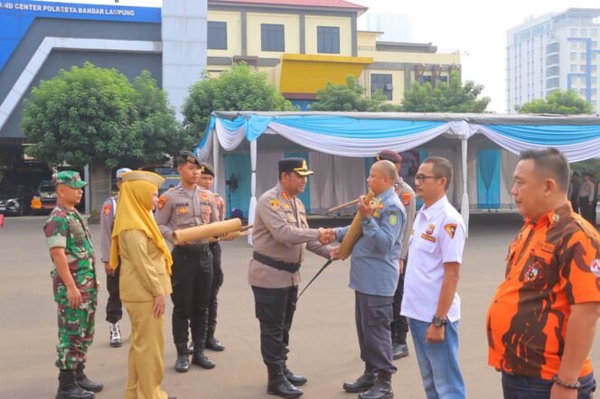 
					Kapolresta Bandar Lampung Pimpin Apel Sabuk Kamtibmas, Dorong Warga Aktifkan Siskamling